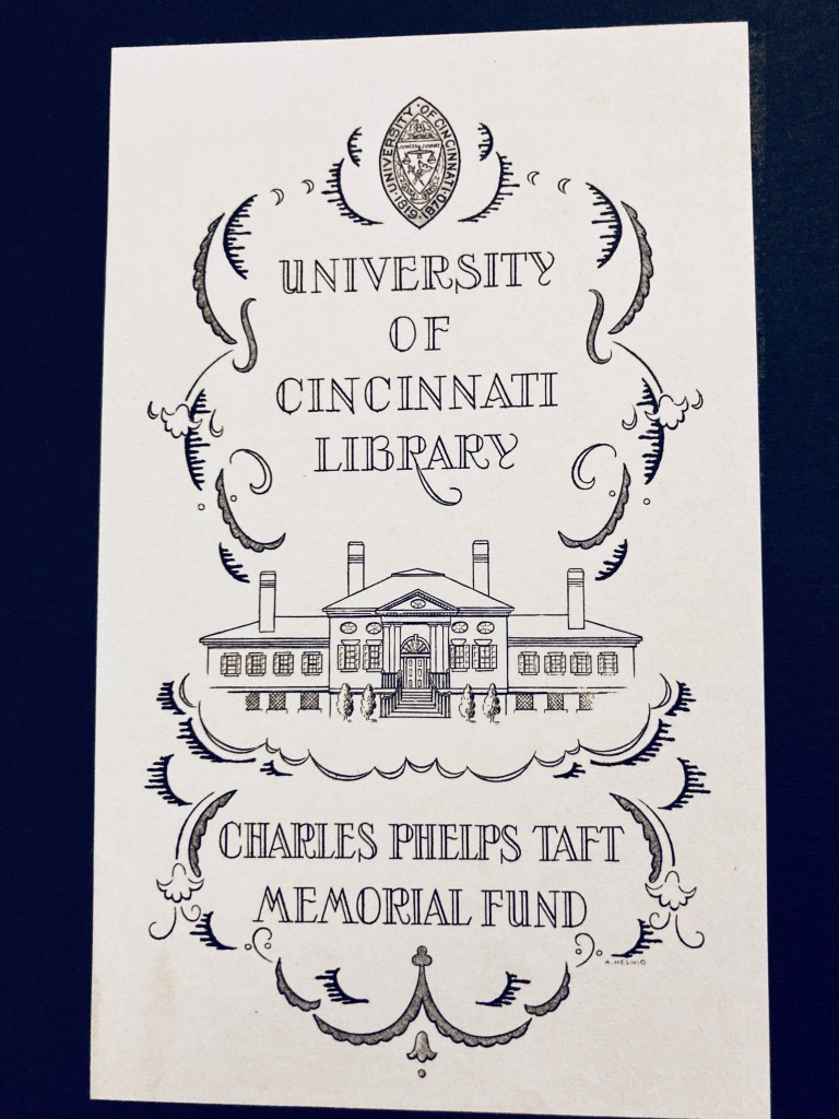 Ornate bookplate with swirls and insignia, reads University of Cincinnati Library, image of building on campus, below image reads Charles Phelps Taft Memorial Fund.